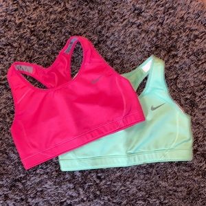 Two small Nike dry fit sports bras